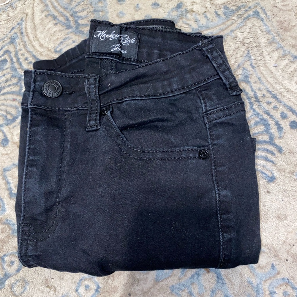 I’m selling a black skinny Jean in a size 0 in black brand “Monkey Ride Jeans”